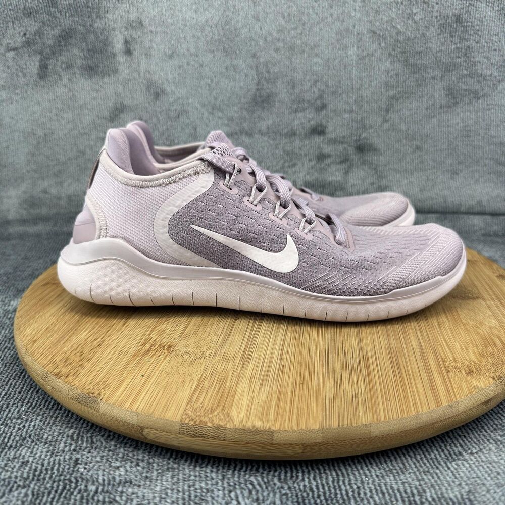 Nike Women's Light Purple (Lavender) Running Shoes with White Swoosh